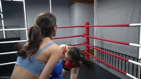 Asian Girls Boxing in Sports Bras