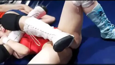 Asian Lesbians Wrestling in Ring