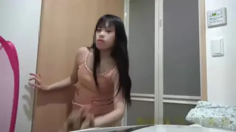 Asian Teen Shows Off Naked in Bedroom