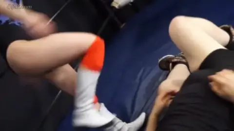 Asian Woman in Explicit Acts with Male Partner