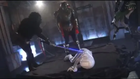 Asian Performers in Costume Interact