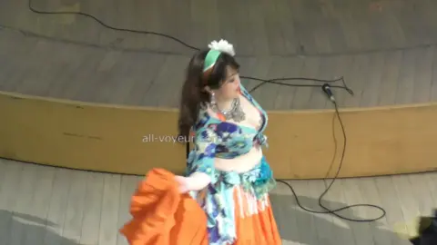 Asian Belly Dancers in Elaborate Costumes