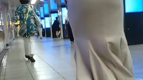 Asian Girls in Subway Station