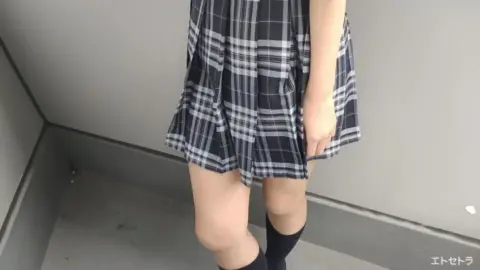 Asian Teen Flaunts Lingerie in Plaid Skirt