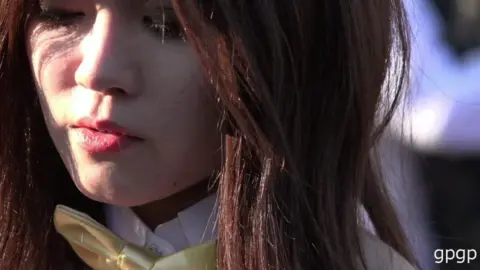 Asian Woman Exposes Herself on Crowded Street