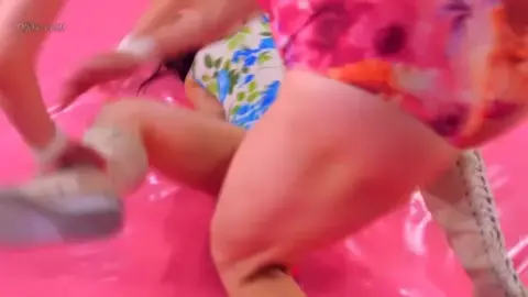 Asian Lesbians Wrestling in Ring