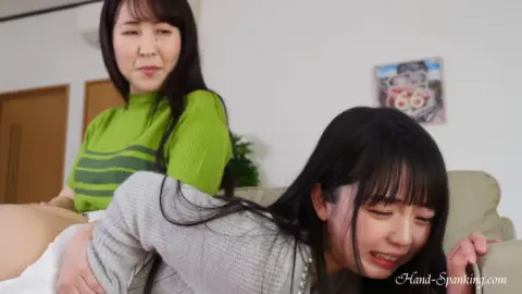 Asian Lesbians Spanking in Living Room