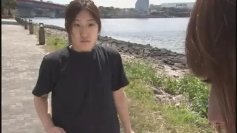 Asian Couple Outdoor Encounter