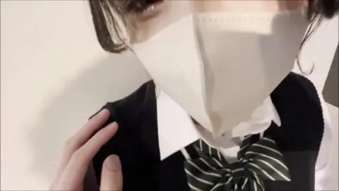 Asian Teen with Braided Pigtails in Erotic Poses