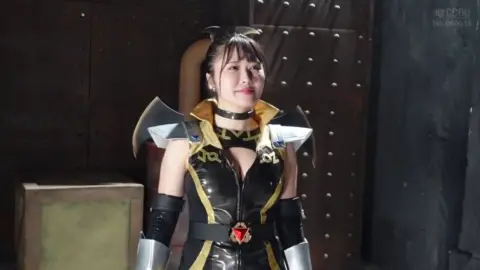 Asian Model in Leather Costume