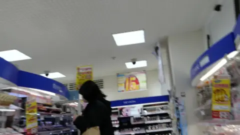 Asian Girl in Convenience Store