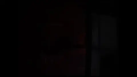 Asian Woman Performs in Dark Room and Bedroom