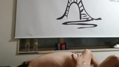 Asian Couple Intimate Bedroom Encounter