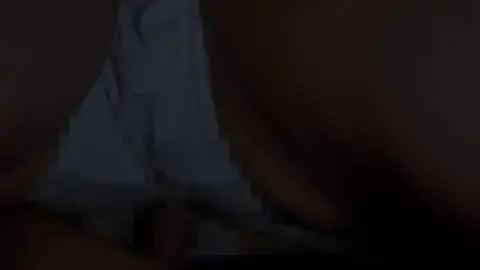 Curvy Brunette Bending Over in Low Light