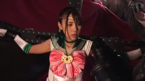 Asian Couple in Fetish Costumes