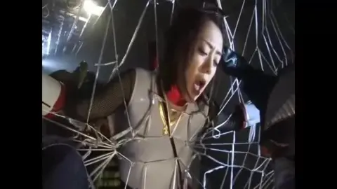 Asian Lesbians in Costume Engaging in Aggressive Play