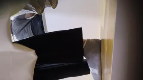 Asian Teen Undresses in Bedroom