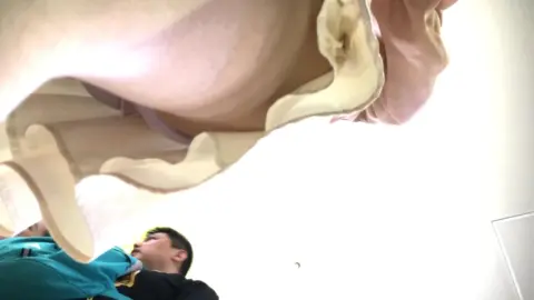 Blonde Teen with Tattoo Gets Intimate in Bedroom