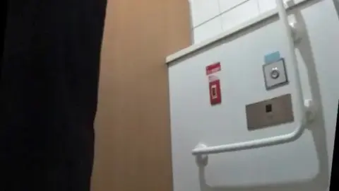 Bending Over in Public Restroom