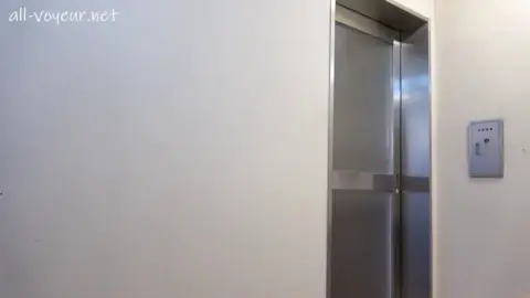 Asian Lingerie Model Undressing in Elevator Lobby