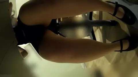 Slim Caucasian Woman in Black Dress Office Scene