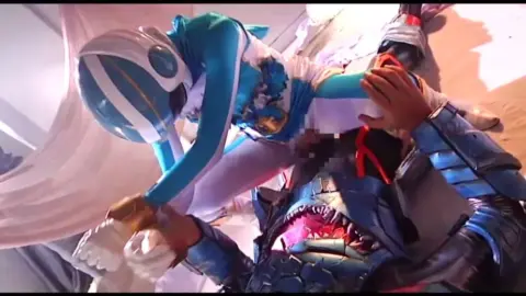 Asian Couple in Costume Intimate Encounter