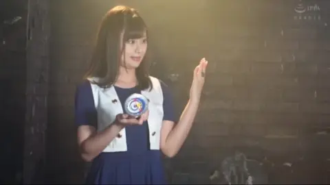 Asian Superheroine in Blue and Gold Costume