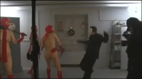 Asian Women in Red Masks Engage in Fights