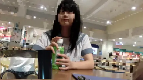 Asian Teen in School Uniform