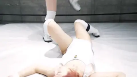 Asian Women Wrestling in Ring